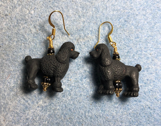 Black ceramic Standard poodle bead earrings adorned with black Czech glass beads.