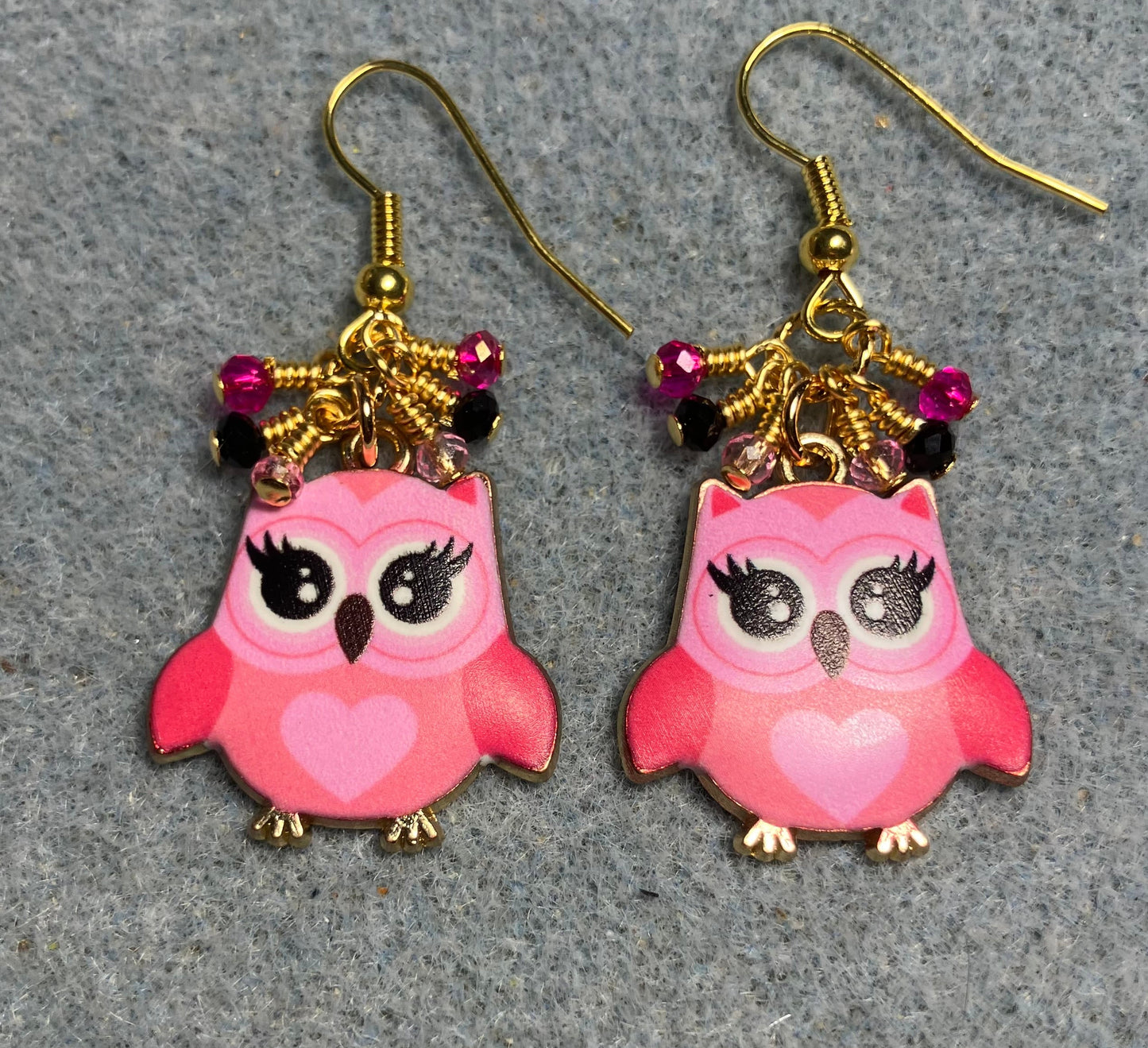 Hot pink, black, and light pink enamel owl charm earrings adorned with tiny dangling hot pink, black, light pink Chinese crystal beads.