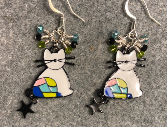 White, black, and multicolored  enamel cat charm earrings adorned with tiny dangling black, turquoise, and olive green Chinese crystal beads.