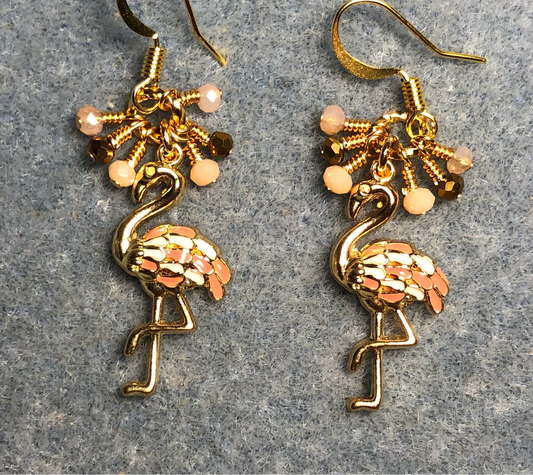 Gold and peach enamel flamingo charm earrings adorned with tiny dangling gold and peach Chinese crystal beads.