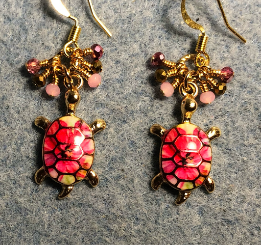 Bright pink enamel turtle charm earrings adorned with tiny dangling pink, gold, and rose Chinese crystal beads.