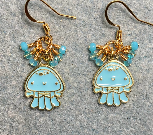 Turquoise and gold enamel jellyfish charm earrings adorned with tiny dangling turquoise Chinese crystal beads.