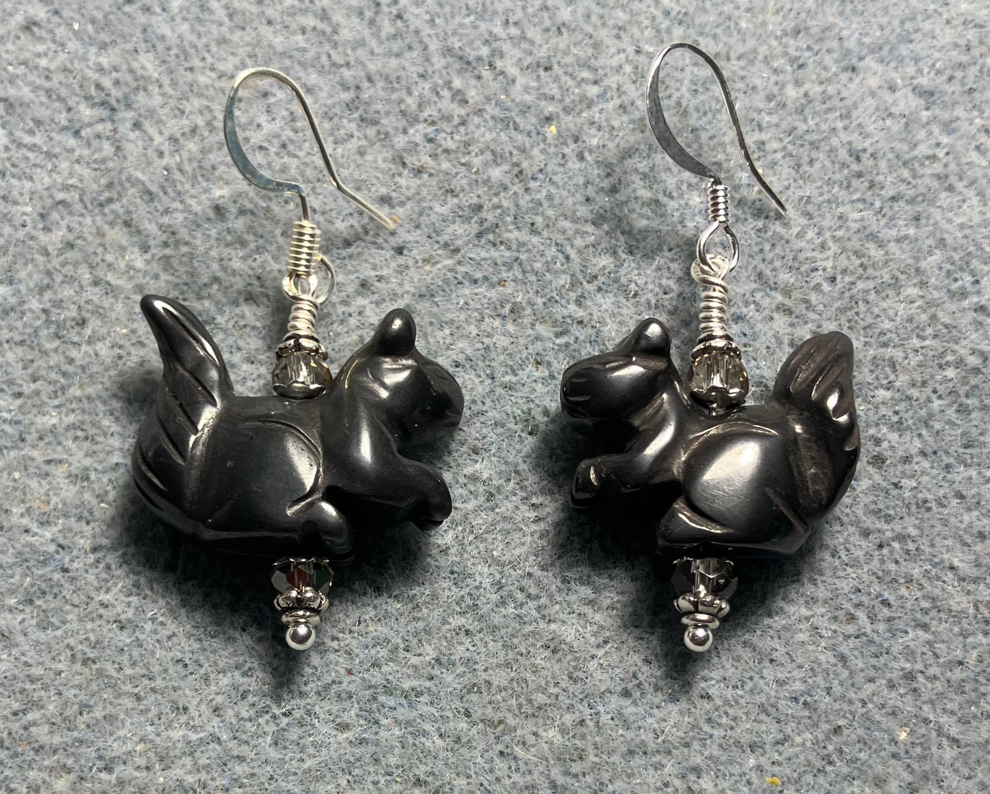 Gray hematite gemstone squirrel bead earrings adorned with gray Chinese crystal beads.
