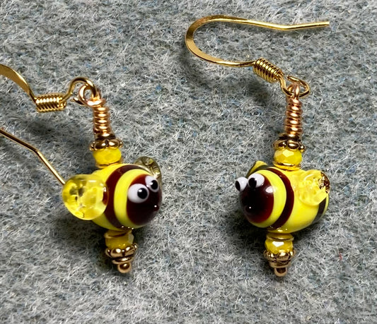 Small yellow and black lamp work striped honeybee bead earrings adorned with yellow Chinese crystal beads.