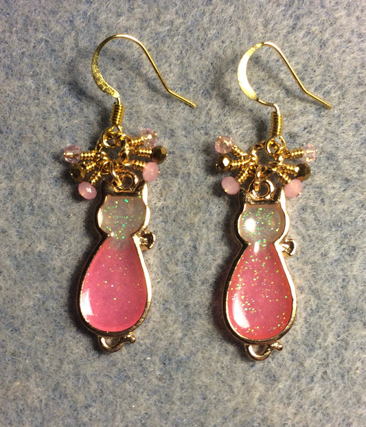 Pink and gold sparkly resin cat charm earrings adorned with small dangling pink and gold Chinese crystal beads.