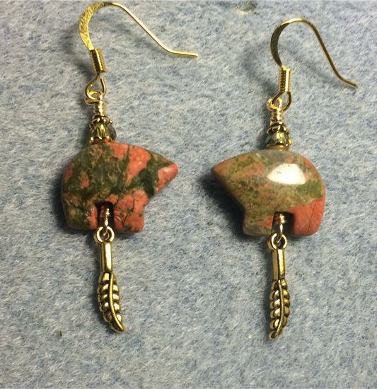 Orange and green unakite gemstone Zuni bear fetish bear earrings adorned with olive green crystal beads and tiny gold feather charms.