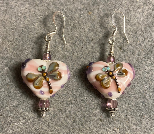 Off white and violet heart shaped lamp work dragonfly bead earrings adorned with violet Czech glass beads.