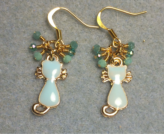 Small light aqua and gold enamel cat charm earrings adorned with tiny dangling light aqua Chinese crystal beads.