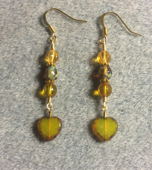 Small amber Czech glass heart bead earrings adorned with amber Czech glass beads.