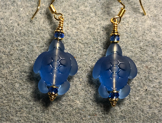 Blue sea glass sea turtle bead earrings adorned with blue Chinese crystal beads.