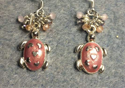 Silver and mauve pink enamel turtle charm earrings adorned with tiny dangling pink and peach Chinese crystal beads.