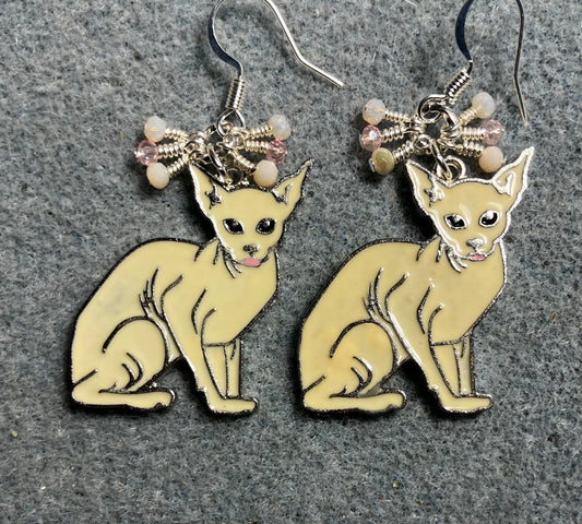 Off white and silver enamel Sphynx cat charm earrings adorned with tiny dangling white and pink Chinese crystal beads.