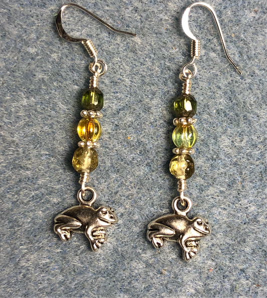 Small silver frog charm earrings adorned with small light green Czech glass beads