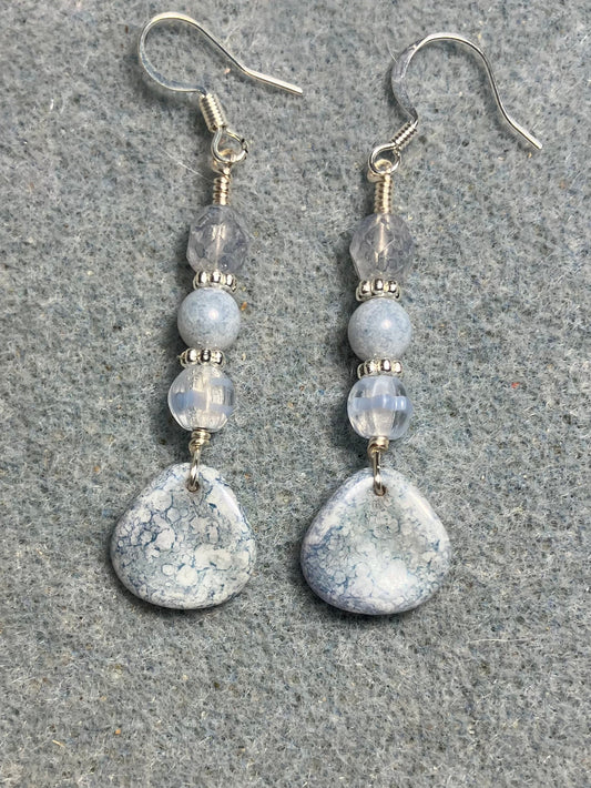 Light blue speckled Czech glass rose petal earrings adorned with light blue Czech glass beads.