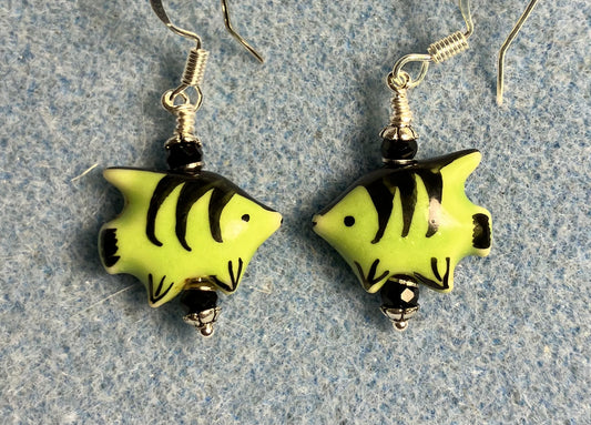 Small green and black ceramic fish bead earrings adorned with black Chinese crystal beads.
