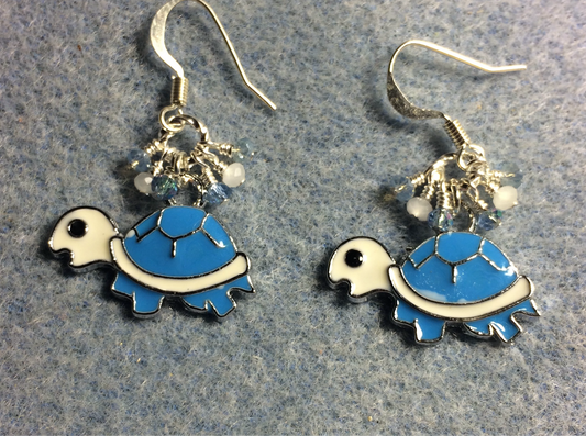 Light blue and white enamel turtle charm earrings adorned with tiny dangling light blue and white Chinese crystal beads.