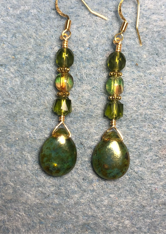 Olive green Czech glass pear drop bead earrings adorned with olive green Czech glass beads.