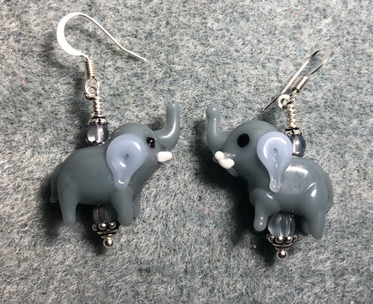 Opaque blue gray lamp work elephant bead earrings adorned with blue gray Czech glass beads.