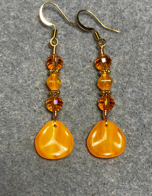 Tangerine Czech glass rose petal earrings adorned with tangerine and orange Czech glass beads.