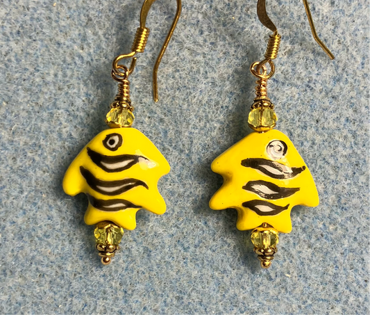 Small yellow and black ceramic fish bead earrings adorned with yellow Chinese crystal beads.