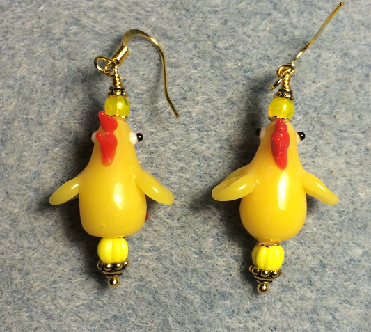 Silly yellow and red lamp work chicken bead earrings adorned with yellow Czech glass beads.