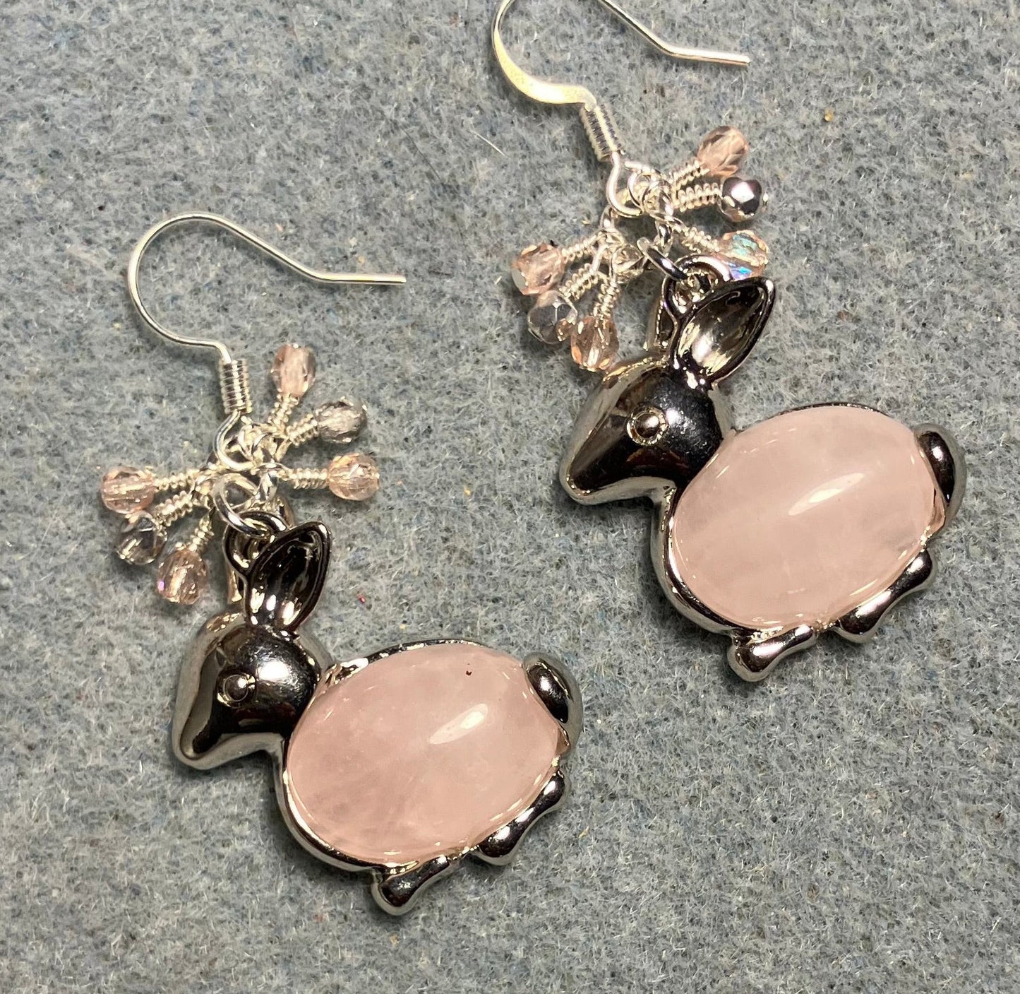 Large silver and pink quartz gemstone rabbit charm earrings adorned with small dangling rose, pink, and silver Czech glass beads.