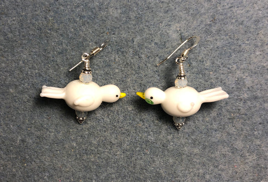 Small white lamp work dove bead earrings adorned with white Chinese crystal beads.