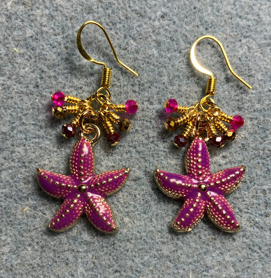 Dark pink and gold enamel starfish charm earrings adorned with tiny dangling dark pink and gold Chinese crystal beads.