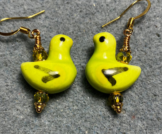 Lime green, black, and yellow ceramic duck bead earrings adorned with lime green Chinese crystal beads.