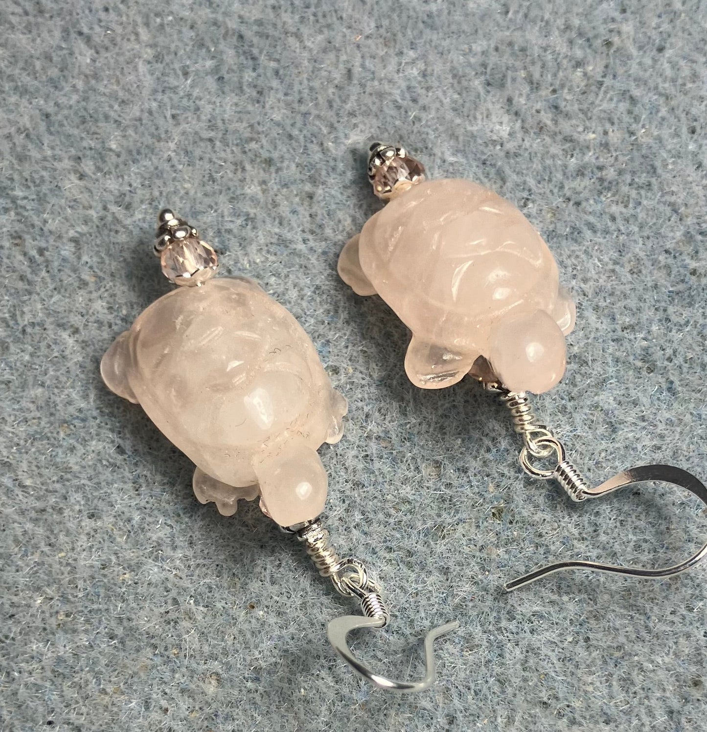 Pink rose quartz gemstone turtle bead earrings adorned with pink Chinese crystal beads.