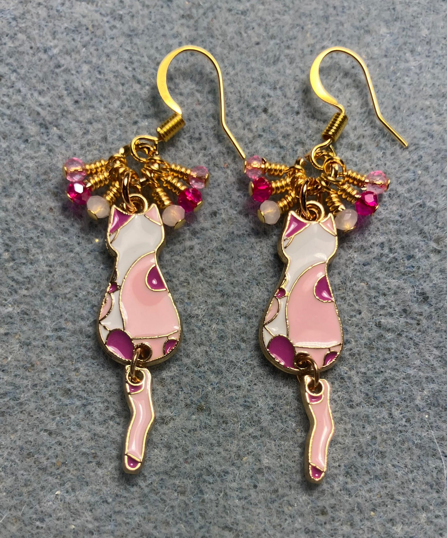 Hot pink, light pink, and white enamel cat charm earrings adorned with tiny dangling hot pink, light pink, and white Chinese crystal beads.