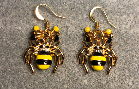 Black and yellow enamel striped spider charm earrings adorned with tiny dangling black, gold, and yellow Chinese crystal beads.