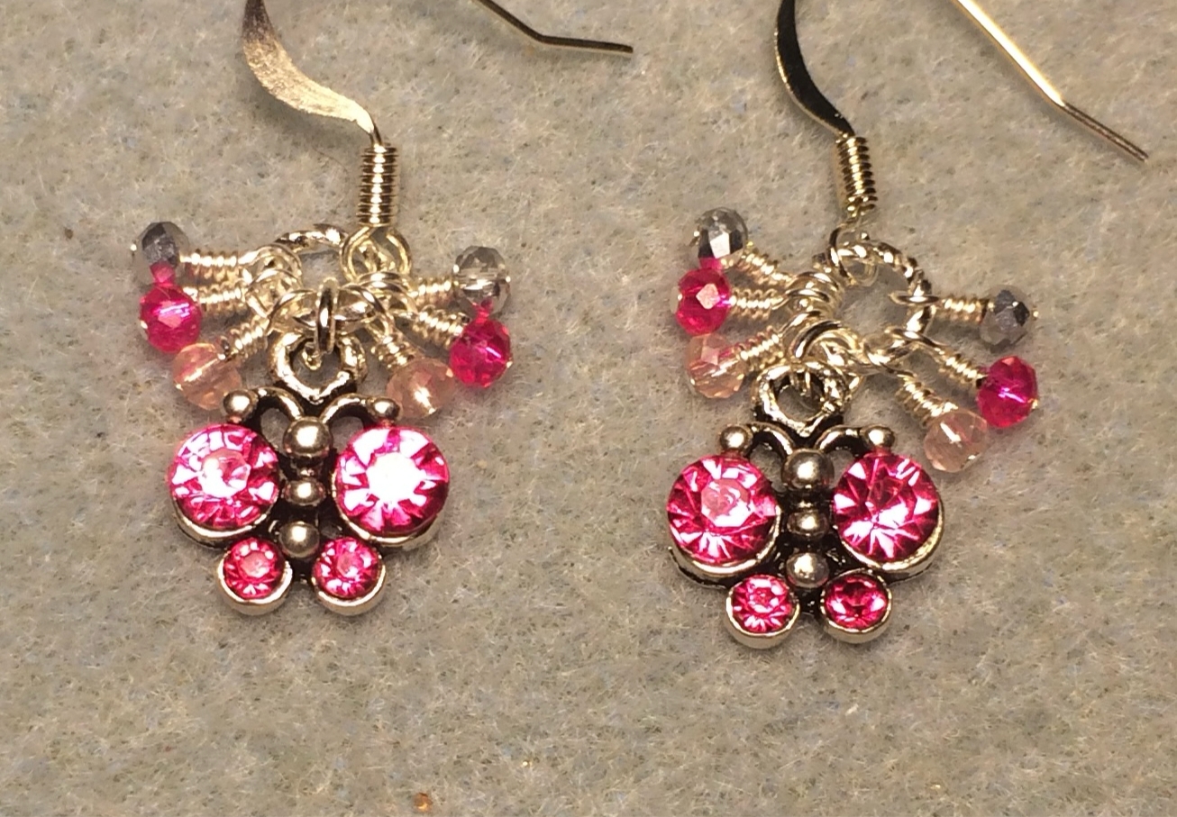 Small hot pink rhinestone butterfly charm earrings adorned with tiny dangling hot pink, silver, and light pink Chinese crystal beads.