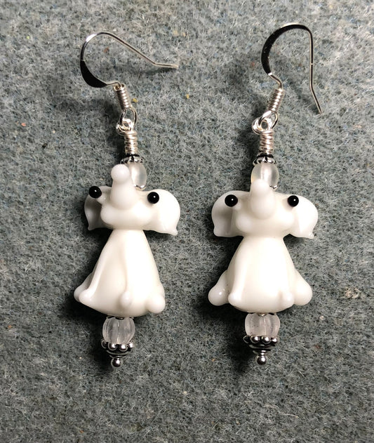 Opaque white lamp work sitting elephant bead earrings adorned with frosty white Czech glass beads.