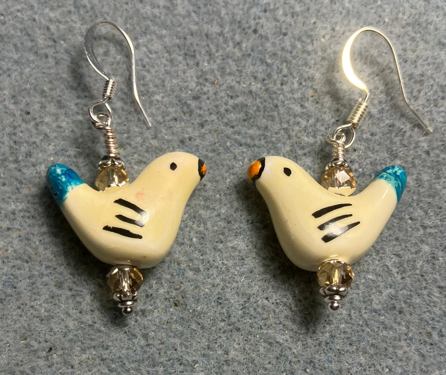 Small light yellow and turquoise ceramic bird bead earrings adorned with light yellow Chinese crystal beads.