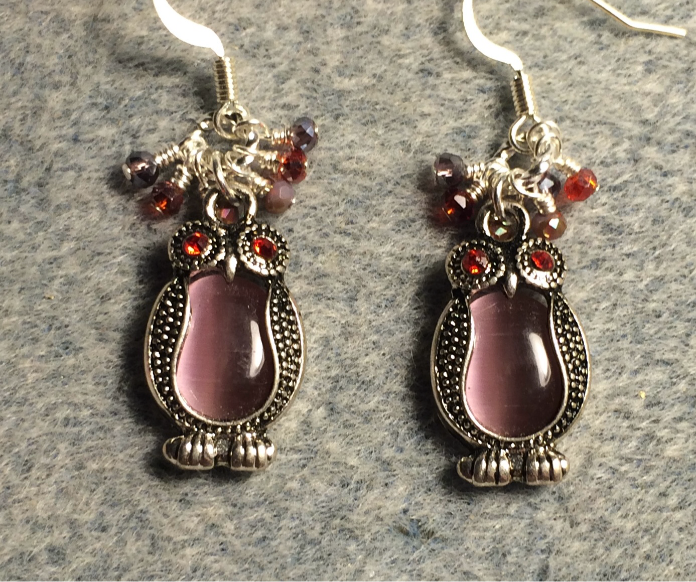 Vintage silver and purple fiber optic owl charm earrings adorned with tiny dangling purple and red Chinese crystal beads.
