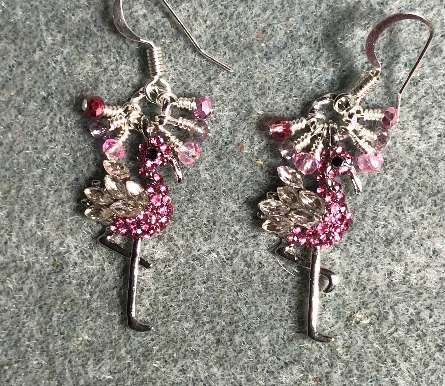 Silver and pink rhinestone flamingo charm earrings adorned with tiny dangling pink and clear Chinese crystal beads.