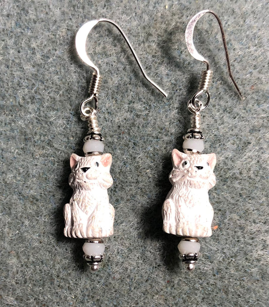 Small white ceramic cat bead earrings adorned with white Chinese crystal beads.