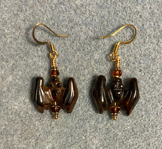 Brown tigereye gemstone bat bead earrings adorned with brown Chinese crystal beads.