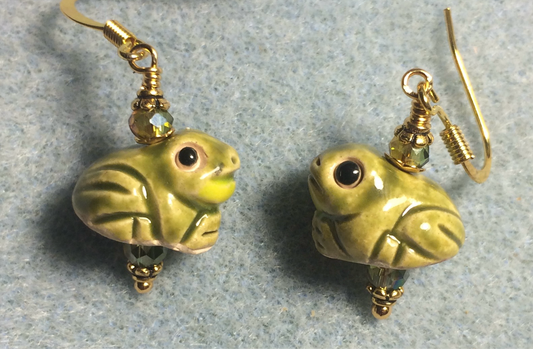 Small olive green ceramic frog bead earrings adorned with sparkly olive green Chinese crystal beads.