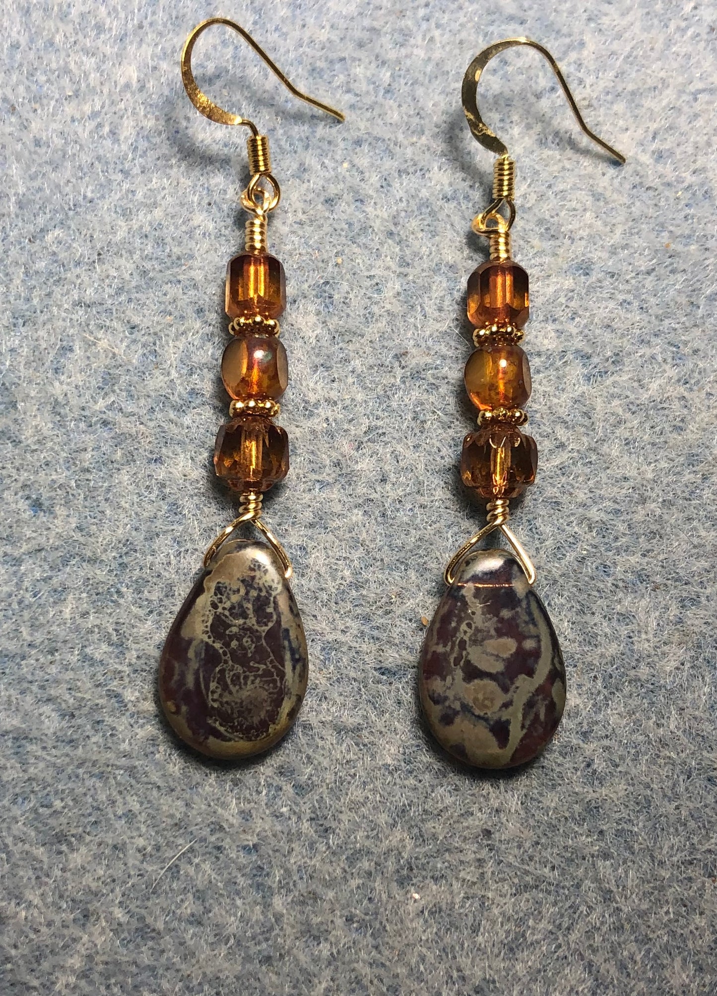 Topaz Picasso Czech glass pear drop bead earrings adorned with topaz Czech glass beads.