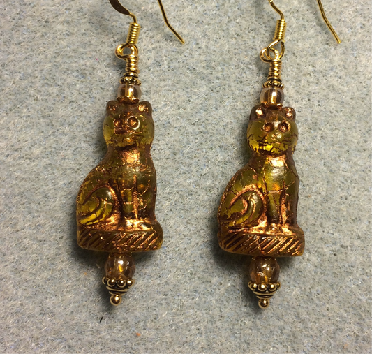 Olive green amber (with gold inlay) fancy Czech glass cat bead earrings adorned with amber Czech glass beads.