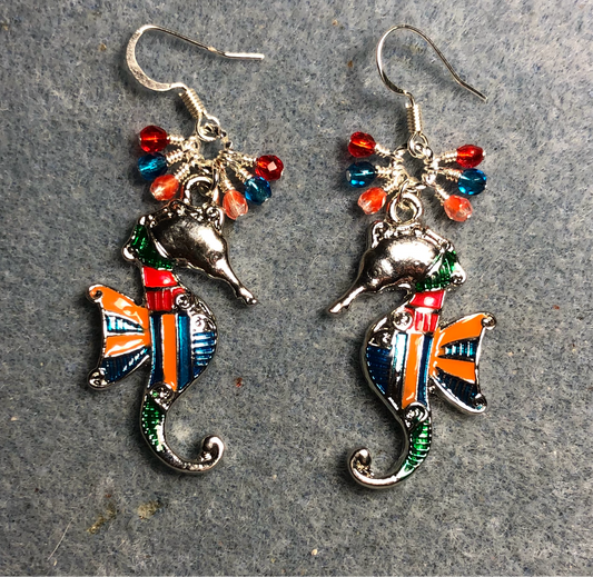 Large turquoise, orange, and red enamel seahorse charm earrings adorned with small dangling turquoise, orange, and red Czech glass beads.