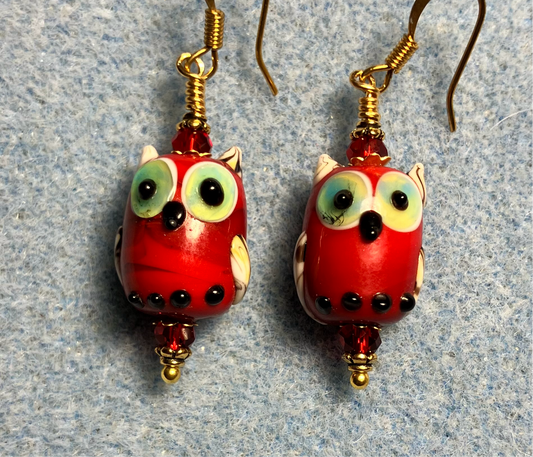 Red lamp work owl bead earrings adorned with red Chinese crystal beads.