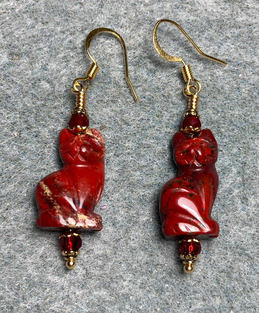 Red poppy jasper gemstone cat bead earrings adorned with dark red Chinese crystal beads.