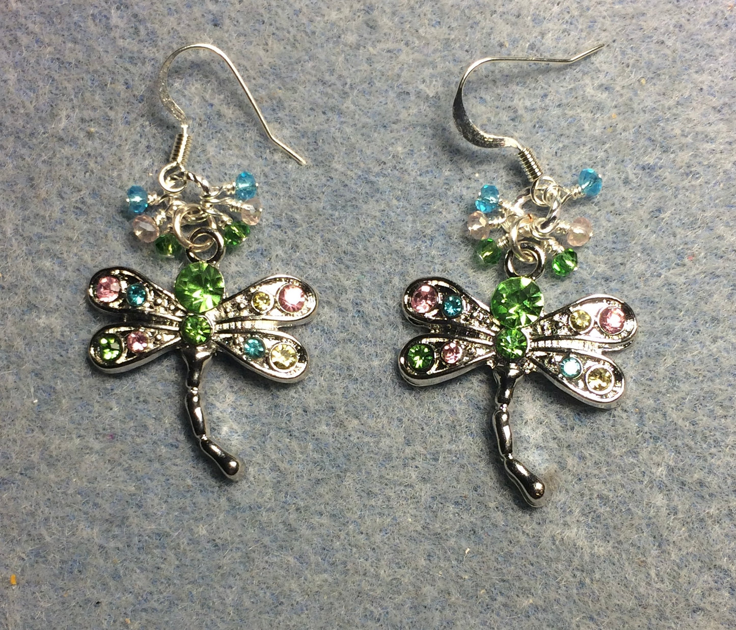 Silver and green, pink, and aqua rhinestone dragonfly charm earrings adorned with tiny dangling green, pink, and aqua Chinese crystal beads.