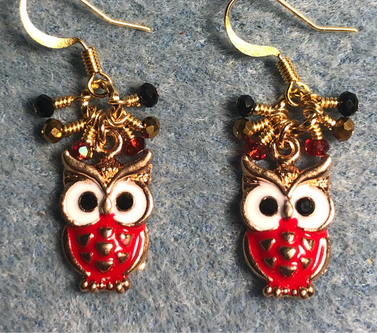 Red and white enamel owl charm earrings adorned with tiny dangling red, gold, and black Chinese crystal beads.