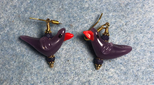 Opaque purple lamp work songbird bead earrings adorned with purple Chinese crystal beads.
