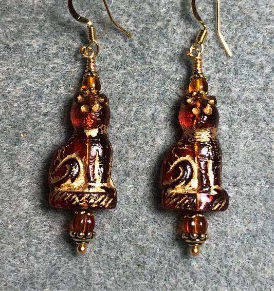 Translucent caramel (with gold inlay) fancy Czech glass cat bead earrings adorned with caramel Czech glass beads.