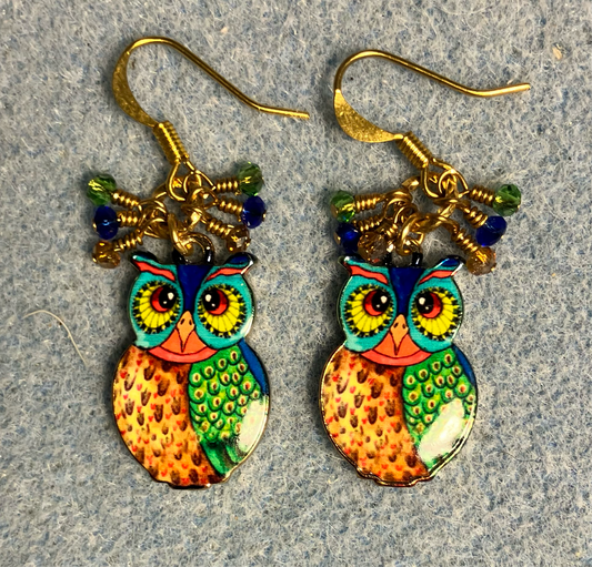 Orange, green, and dark blue enamel owl charm earrings adorned with tiny dangling orange, green, and dark blue Chinese crystal beads.
